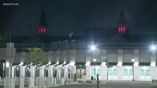Remembering John Asher: Churchill Downs lights up spires in WKU red for spokesman