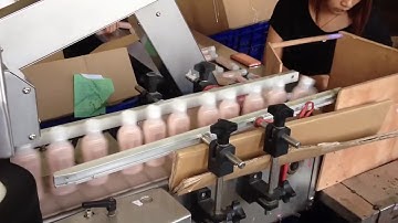 Front/back labeling machine