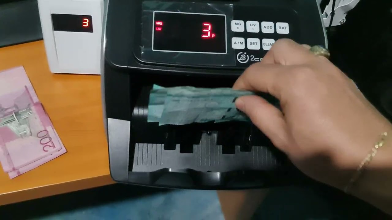 ¿cómo usar una contadora de billetes?