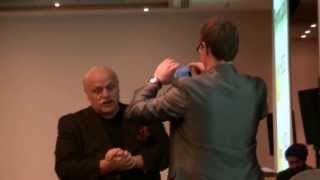 Gerry Robert promotes hisHow to write a book supertraining on stage in Amsterdam