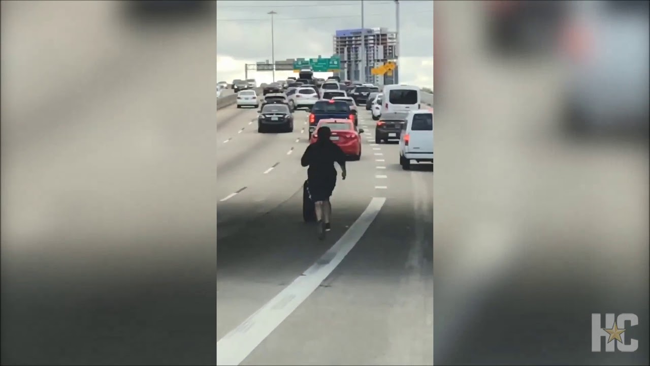 Man caught on video chasing tire rolling down Interstate 45 YouTube