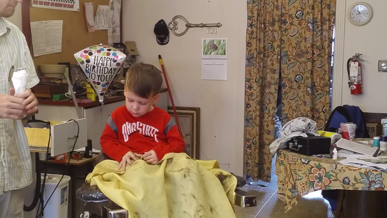 Max finishing his haircut at Howard's Barber Shop YouTube