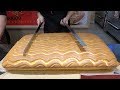 Grand jiggly cake cutting