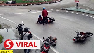 CCTV footage shows motorcyclists fall one after another  near Kota Bharu roundabout