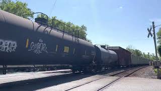 CSX 3150 ES44AH leads CSX M404 with a Sick K5HL and a Loram Ballast cleaner. Through Piscataway,NJ!