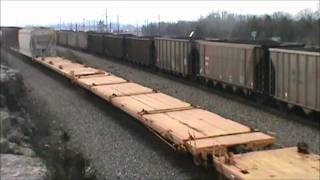 BNSF 6070 Leads NS 734 LD coal racing CSX Q676-14 manifest at Coffey Cliff 2/15/12