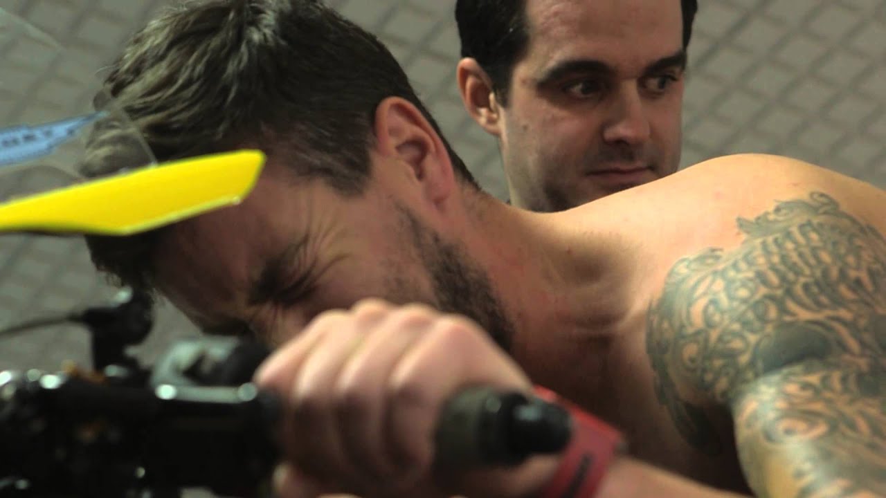 Si Andrews gets physio on a super bike