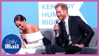 Meghan Markle laughs at Prince Harry's 'date night' joke on stage