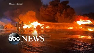 Plane crashes into car dealership, 2 dead