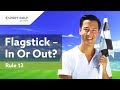 Flagstick in or out  which is better