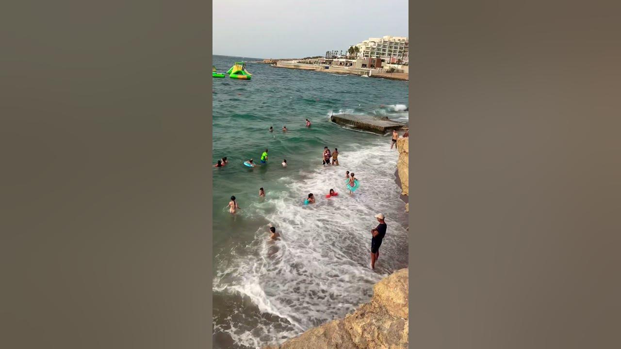 Caught in the Waves 🌊😂 #travel  #waves #ytshorts