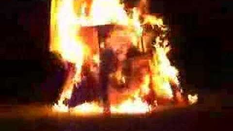 lighting the bonfire with a flaming arrow