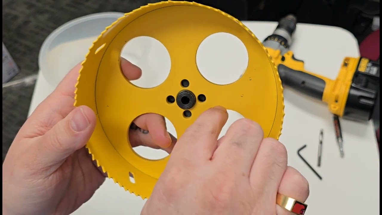 Less mess with this super cool hole saw cutter for recessed lights with dust bowl catcher by KATA!