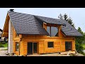 Building The Walls Of The Log Post And Beam House