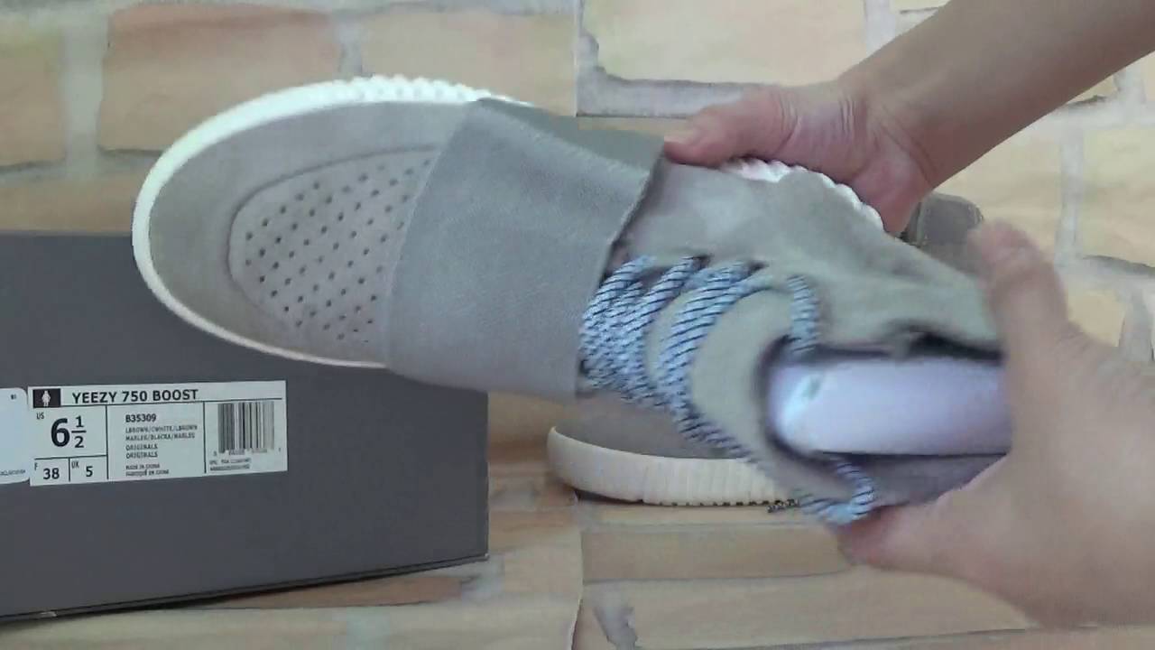 yeezy 750 triple black on feet