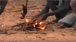 Hadzabe tribe village, Lake Eyasi, Tanzania - Part 1 - Preparing bows and arrows