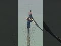 2 people climb to top of Empire State Building
