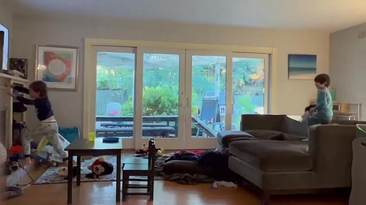 Jack and Tanner play fort with stuffies and floor ...