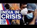 India COVID-19 crisis: Flight bans, humanitarian support, stranded Australians | 9 News Australia