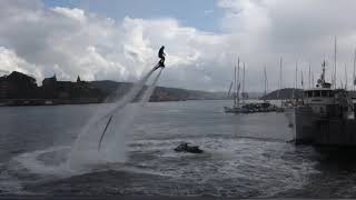 Oslo flying man on water in Norway