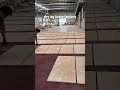 Cross-cut travertine panels are dry laid in our factory.