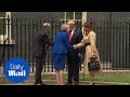 Donald Trump greeted by Theresa May as he arrives at Downing Street