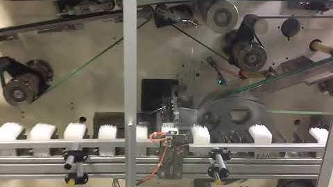 High speed sanitary napkin counting stacker