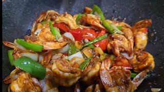 Honey shrimps stir fry bell peppers and onions