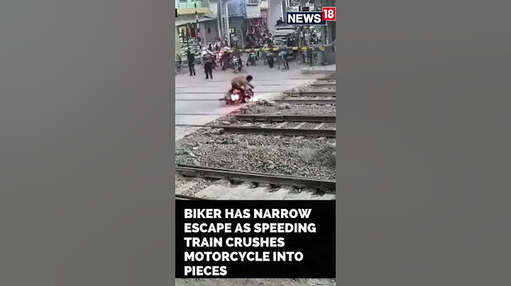 Bike Train Accident News | Biker Escapes Deadly Train Accident | #Shorts | CNN News18