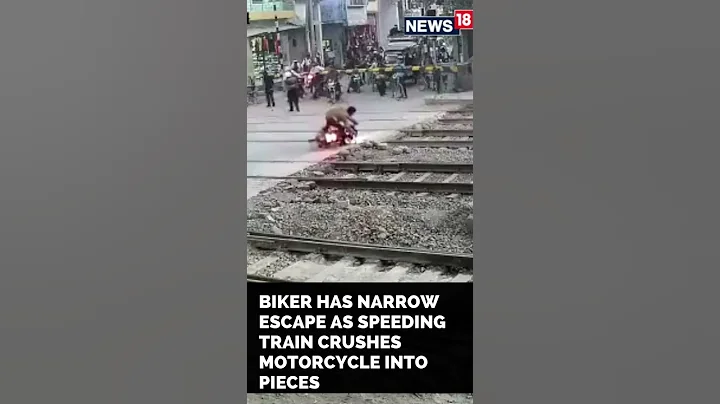 Bike Train Accident News | Biker Escapes Deadly Train Accident | #Shorts | CNN News18 - DayDayNews