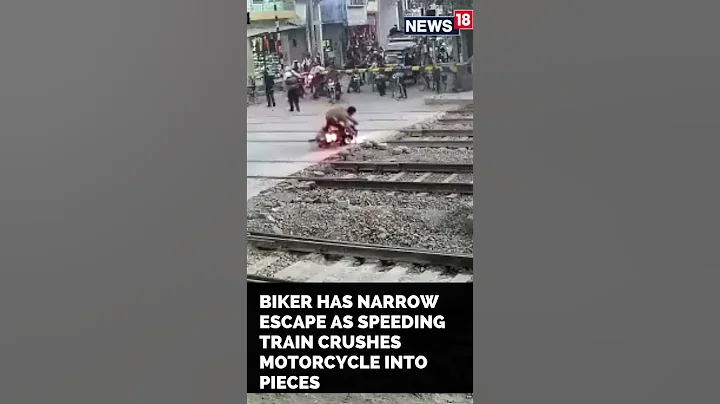 Bike Train Accident News | Biker Escapes Deadly Train Accident | #Shorts | CNN News18 - DayDayNews