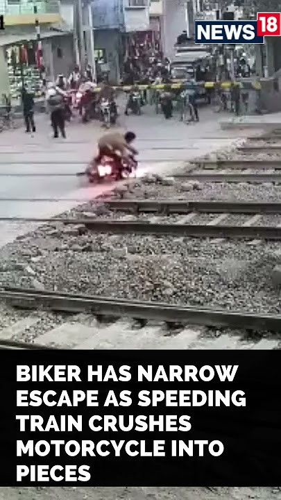 Bike Train Accident News | Biker Escapes Deadly Train Accident | #Shorts | CNN News18