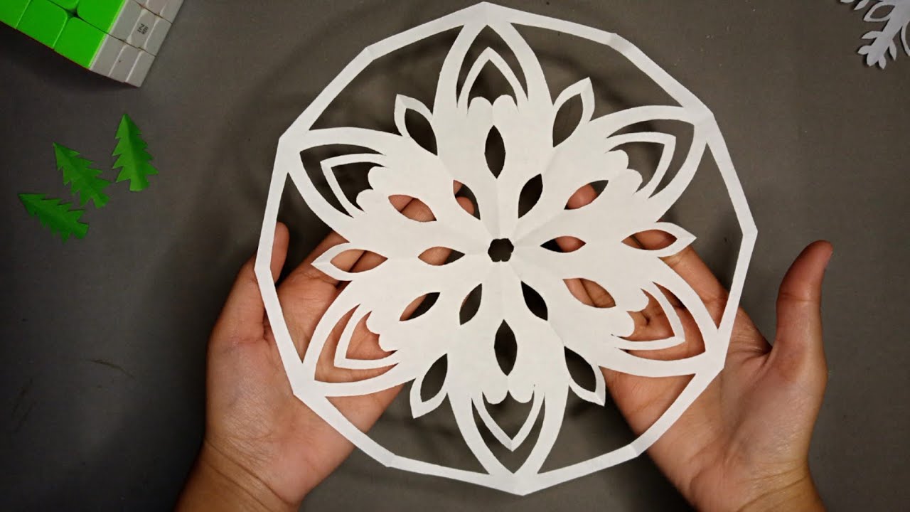 how-to-fold-paper-for-snowflake-cutouts-making-snowflake-out-of-paper