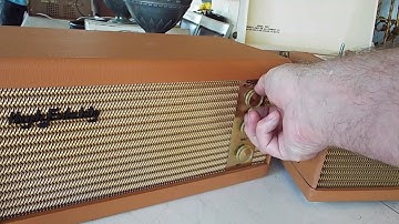 SYMPHONIC record player playing a STEREO 33.3 RPM LP record.