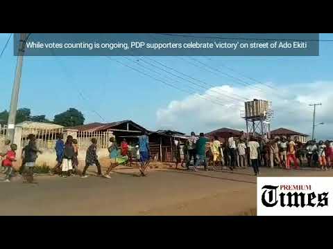 VIDEO: while votes counting is ongoing, PDP supporters celebrate 'victory' on street of Ado Ekiti newspaper mockup