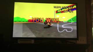 Beating all 4 expert staff ghosts in the Lightning Cup in Mario Kart Wii