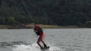A 9 year old girl wakeboard like a pro.