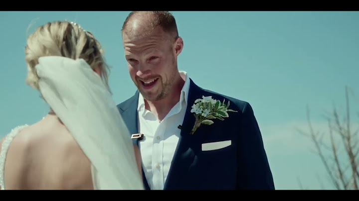Our wedding at Islet Santorini Greece - Captured by Dreamodd Photography