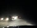 Driving through a blizzard in poland at night