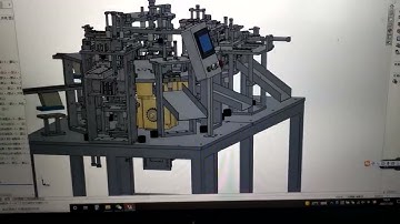 3D drawing of automatic medical assembly machine for medical tube plastic cap valve connectors