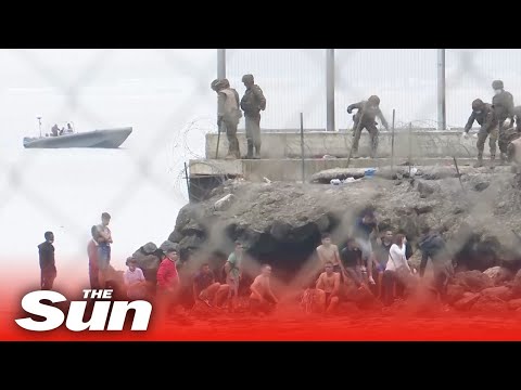 Troops deployed to Spain-Morocco border after thousands of migrants break in