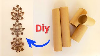 So beautiful wall hanging! out of toilet paper rolls- recycling ideas