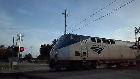 CSX & Amtrak Back To Back On Each Side Of The Track
