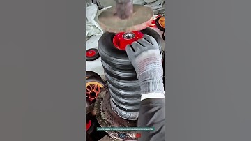 Tire Mounting Process: Carefully Inserting the Rim into the Tire with a Specialized Machine