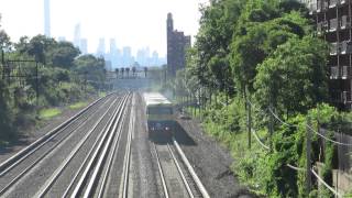 LIRR Main Line: Westbound DM30AC 502 and C3s passing 67 Av Overpass