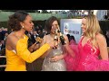 Toast for a Cause: Margot Robbie and Others Cheers for Charities (Exclusive)