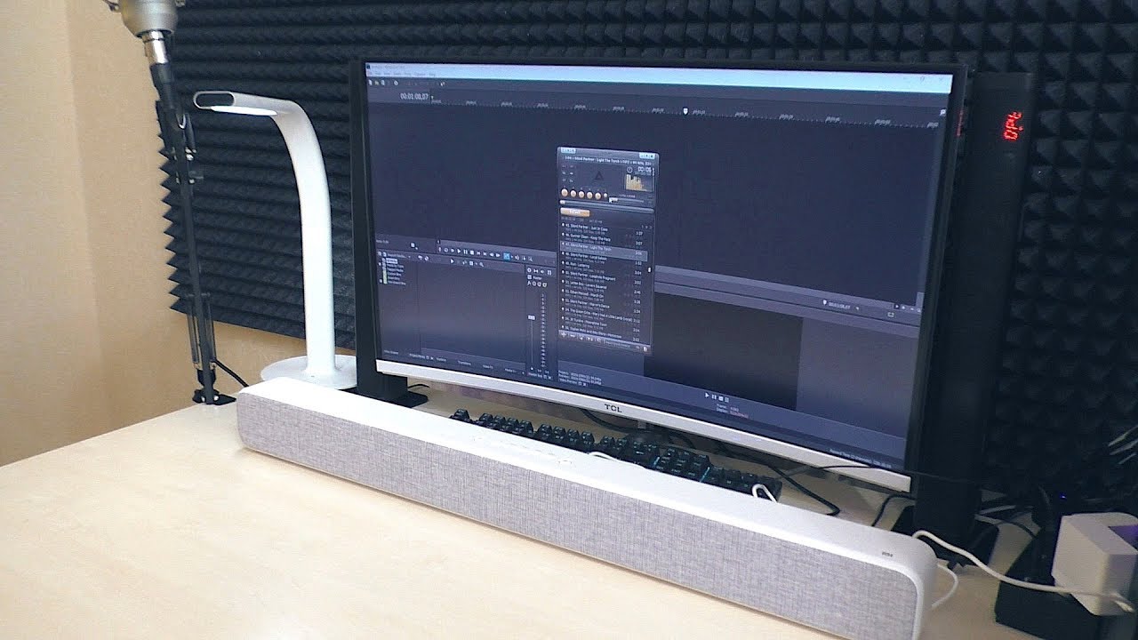 Саундбар для телевизора Xiaomi. Саундбар Сяоми с сабвуфером. Колонки для телевизора Xiaomi. Крепление для саундбара Xiaomi к телевизору.