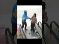 Elderly Woman Faces Escalator Challenge ๐