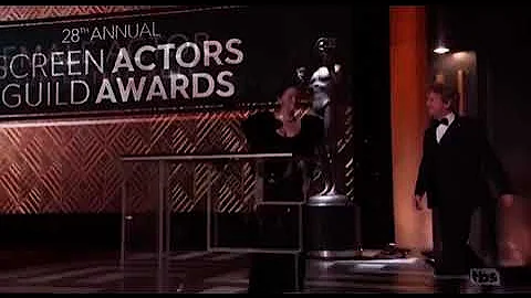 Selena Gomez is barefoot while presenting an awards at the Sags along with Martin Short