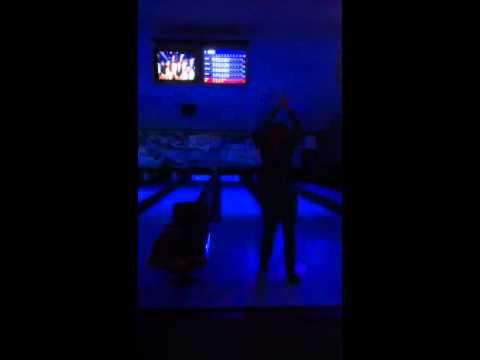 Karen Floyd bowls a strike